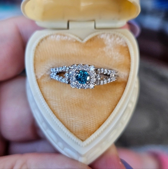 New. 10k Diamond ring Blue & White diamonds! Size 7 1/4 on my ring sizer. I purc